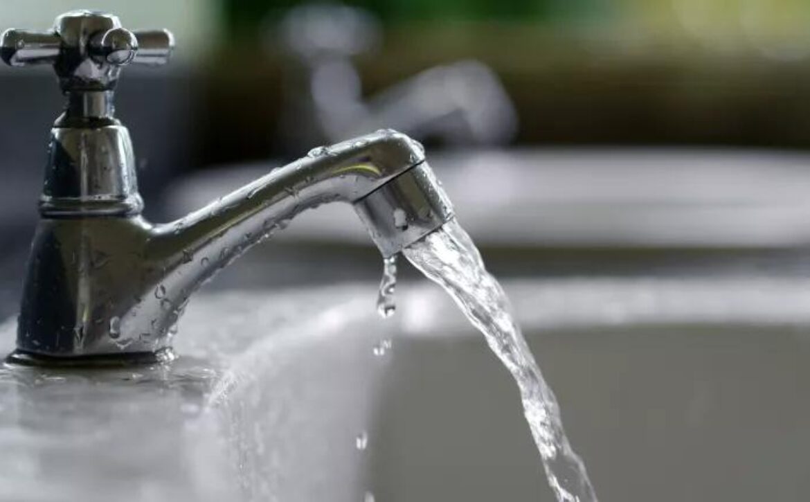 Water coming out of a faucet