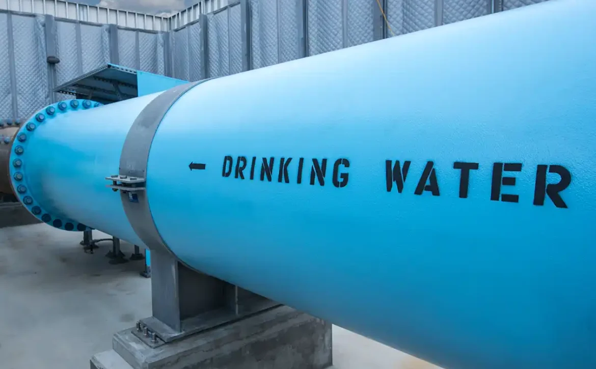 Large water pipe that read Drinking Water