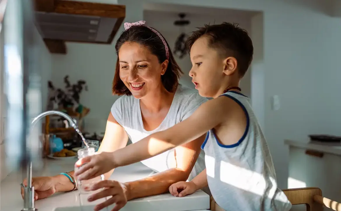 mother-son-filling-glass