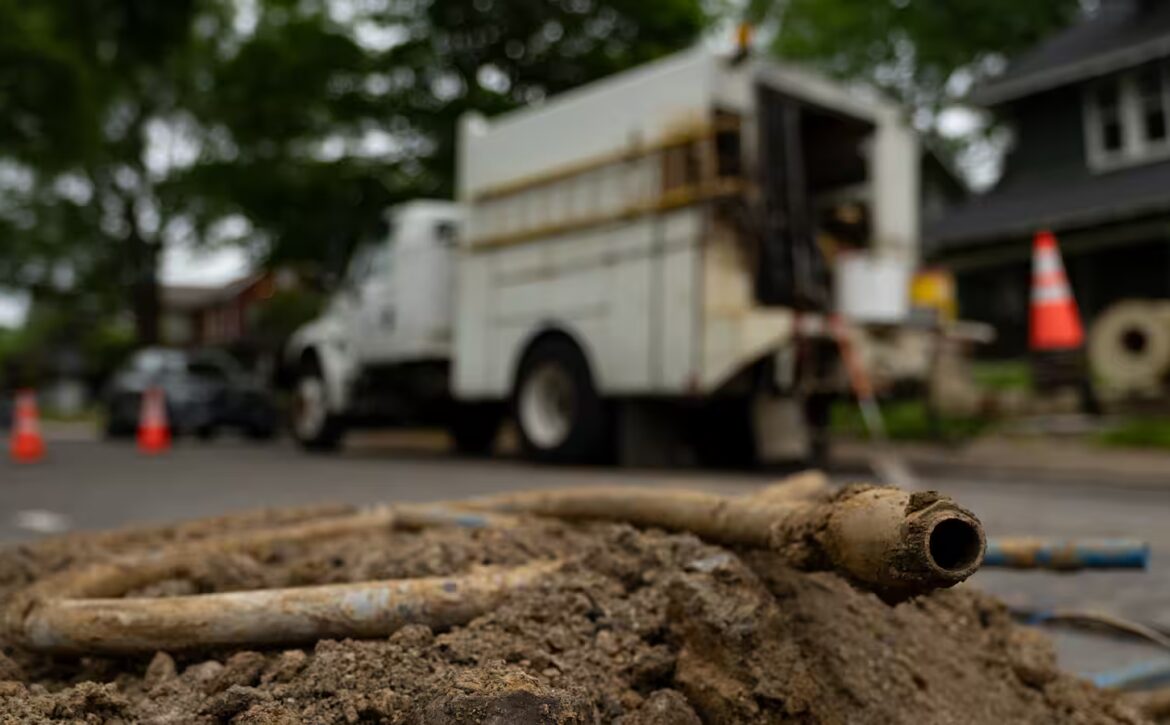 Lead pipe on a dirty pile at a construction site