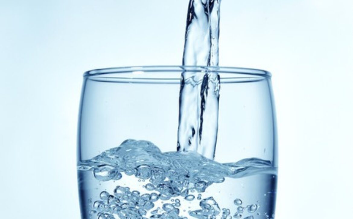 Water pouring into a glass