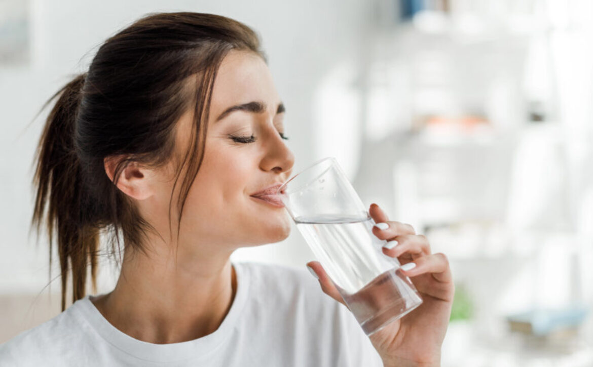 Woman drinking a glass of water