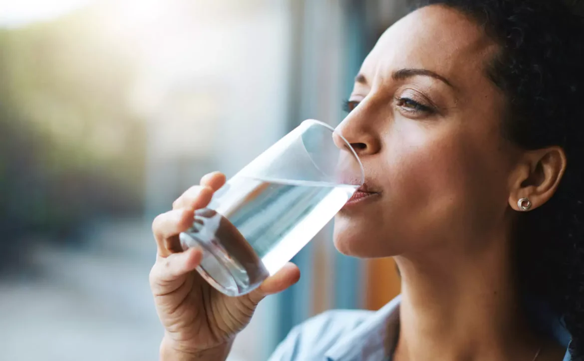 Woman drinking a glass of water